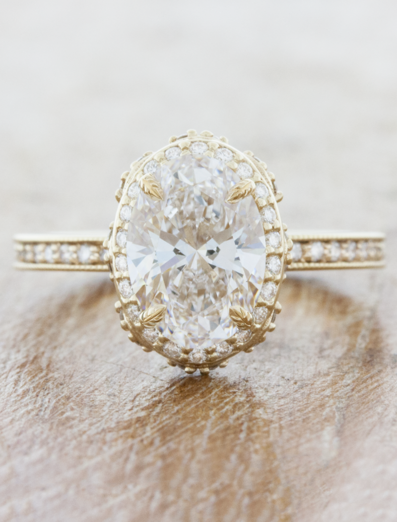 caption:Shown with 1.50ct oval diamond in 14k yellow gold