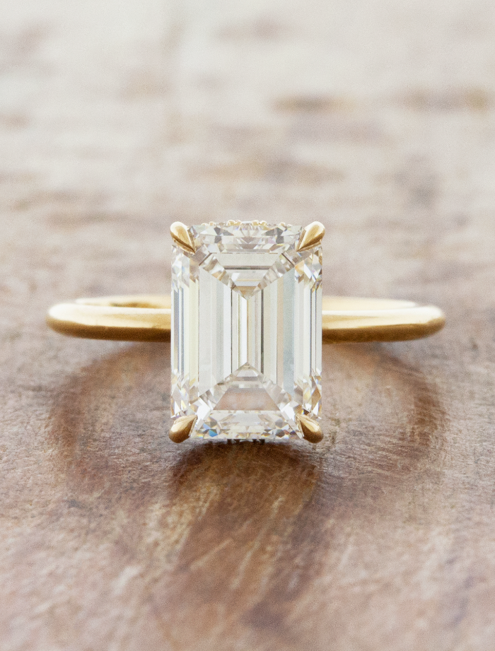 Calista: Emerald Cut Solitaire with Open Diamond Basket Ken