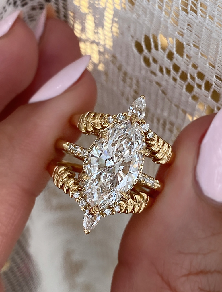 caption:Stacked with Amara with 3ct marquise diamond