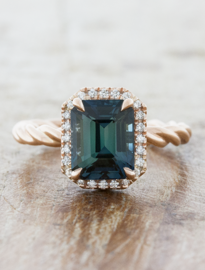 caption:Shown with 3ct emerald cut gemstone in 14k rose gold