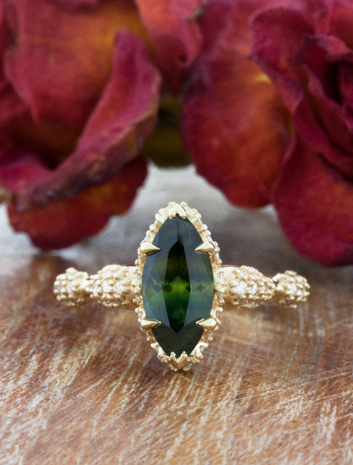 caption:Customized with 1.38ct green sapphire