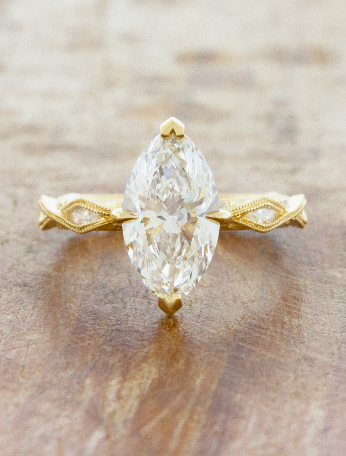 caption:Shown with 2ct marquise diamond in 14k yellow gold