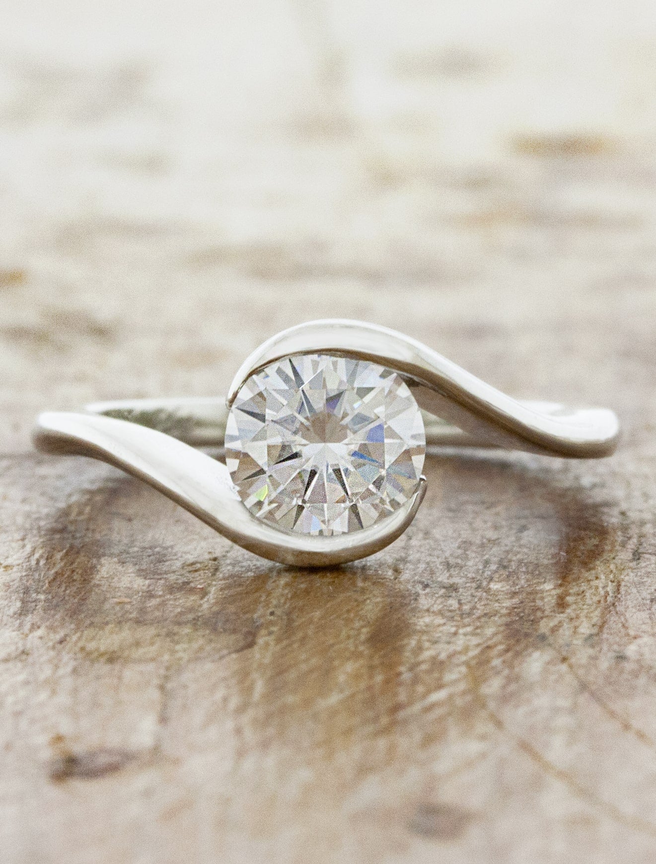 caption:Customized with 1ct round moissanite in platinum