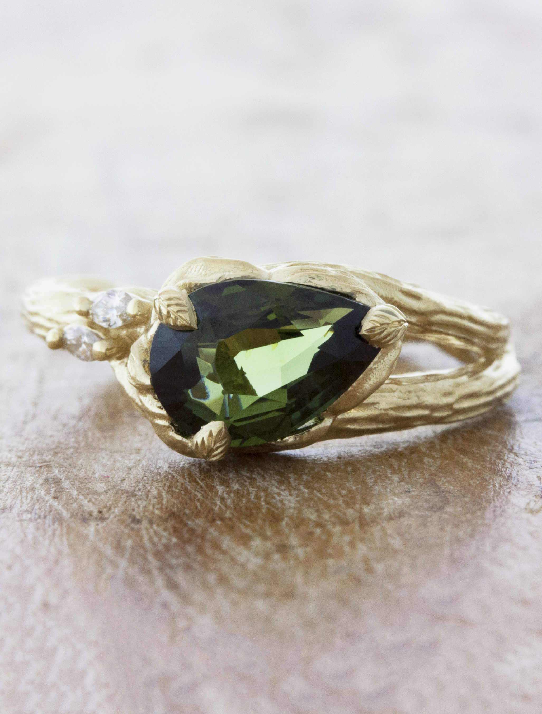 Natural Dark Green Sapphire - Danu Group