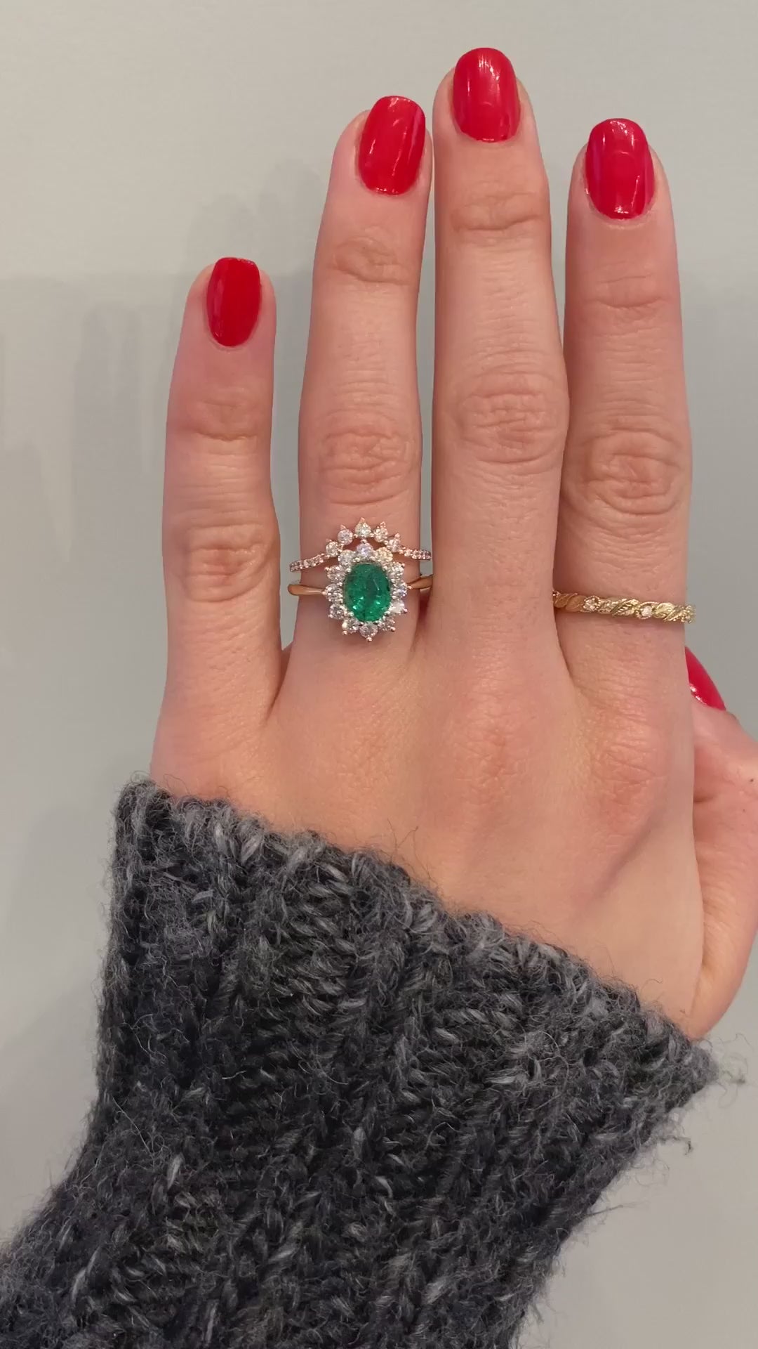 caption:Shown with green emerald oval cut, paired with Anne wedding band 