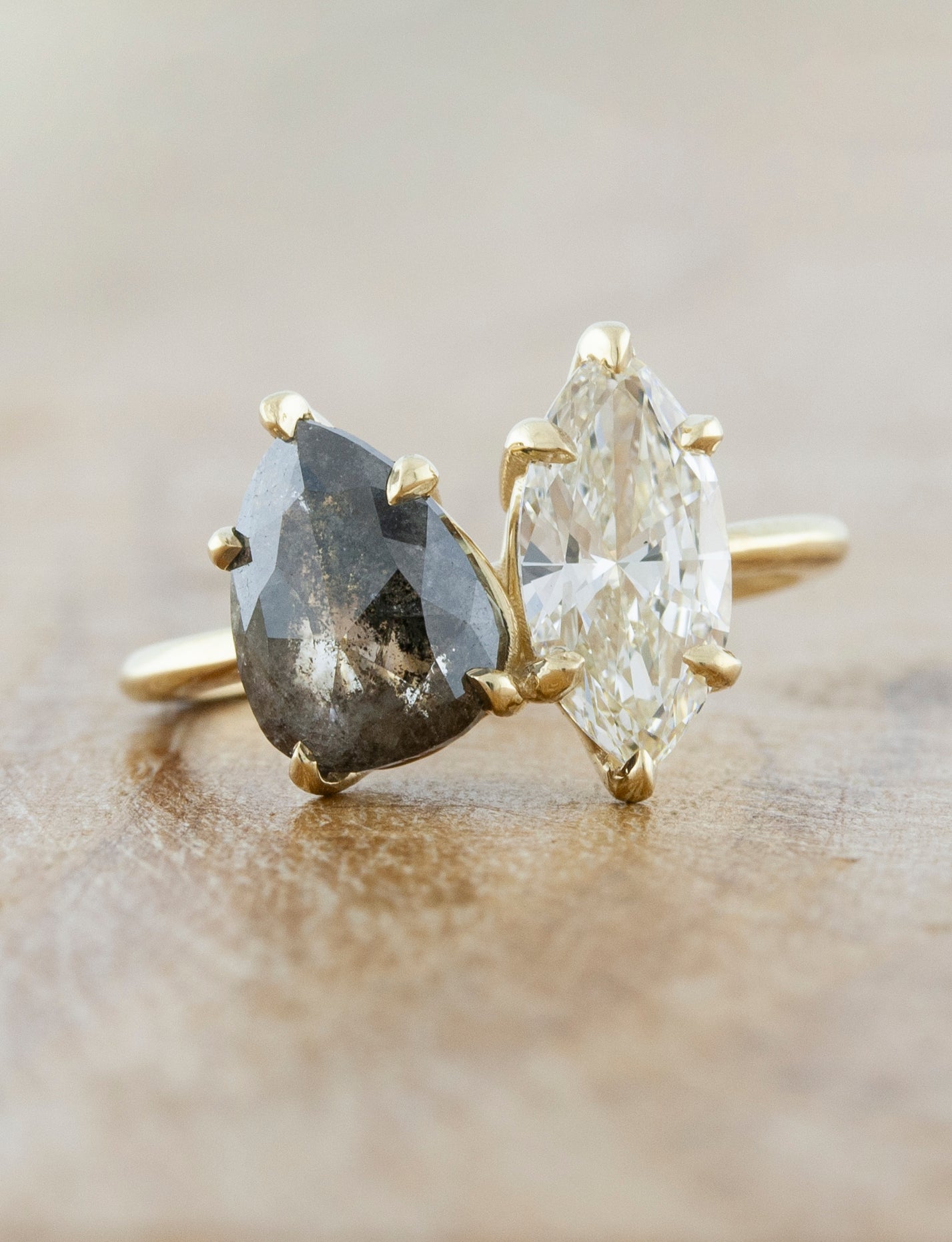 caption:Customized with marquise diamond and salt & pepper pear diamond in 14k yellow gold