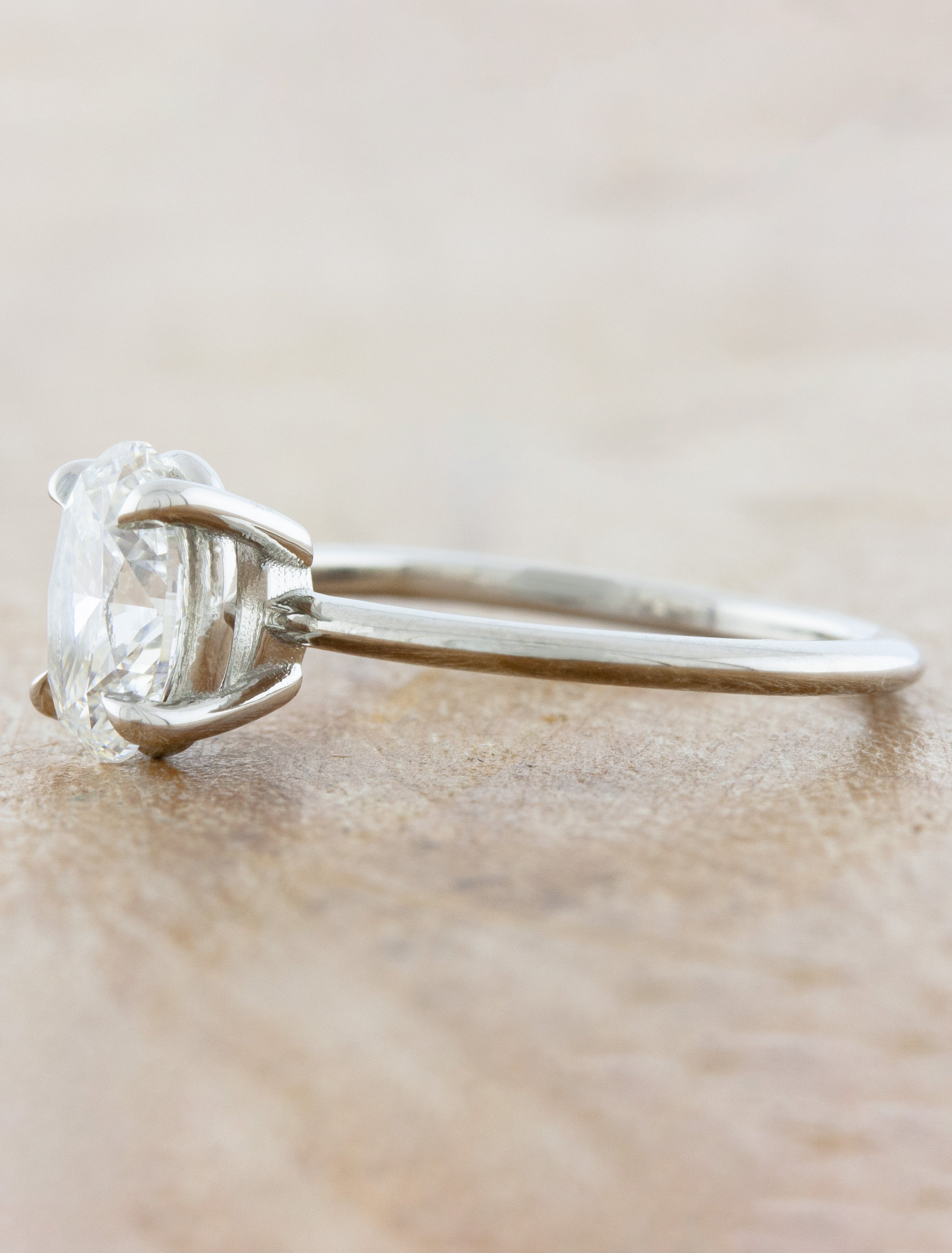 Florina Oval Platinum Solitaire Engagement Ring with a Thin Band Ken