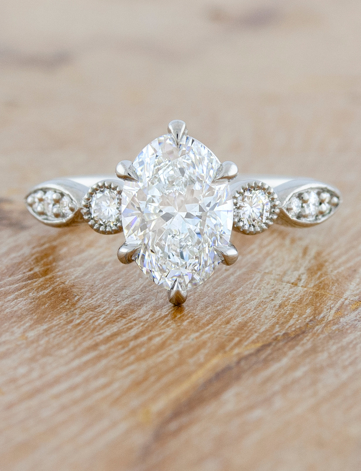caption:Shown with 1.20ct oval diamond in platinum