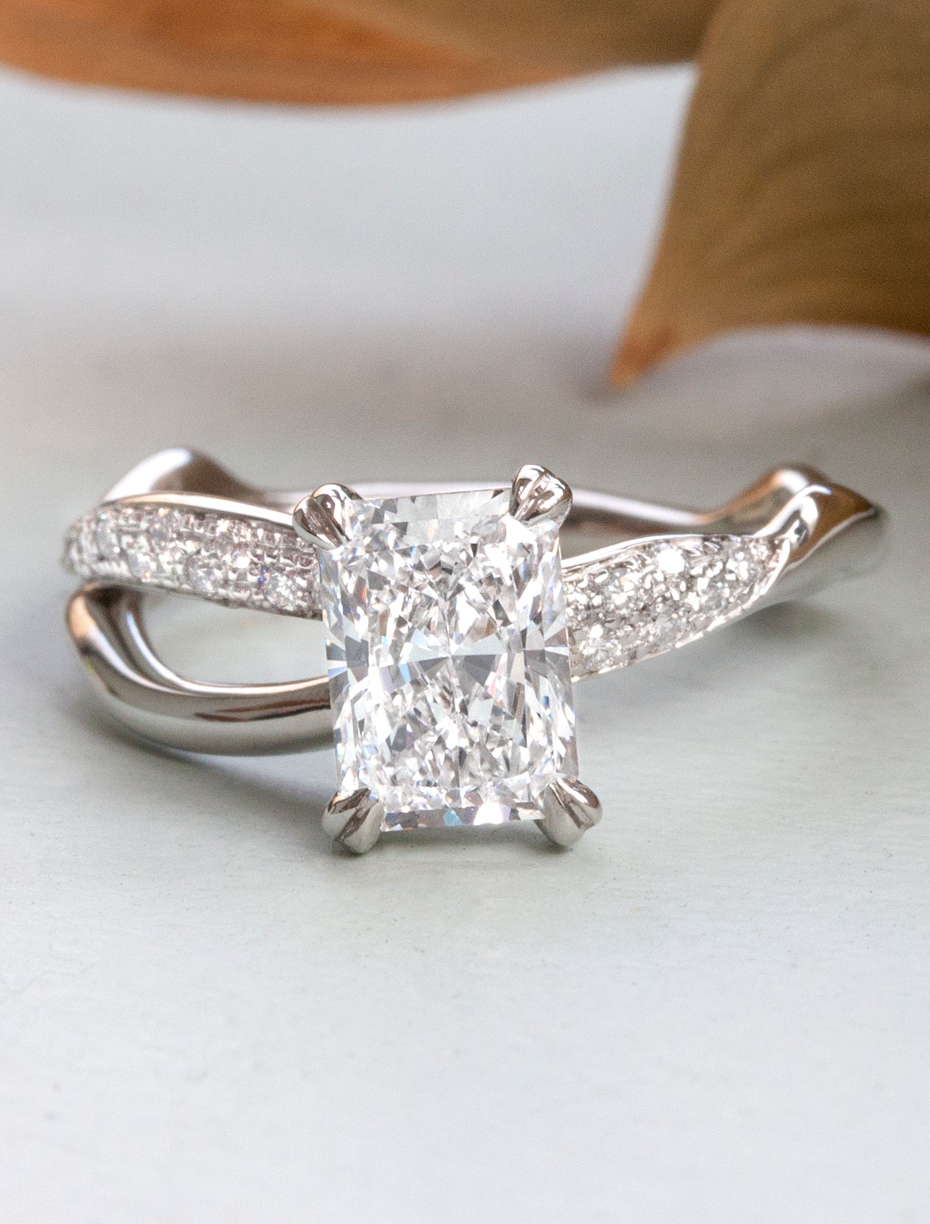 caption:Customized with 1.25ct radiant cut diamond in platinum