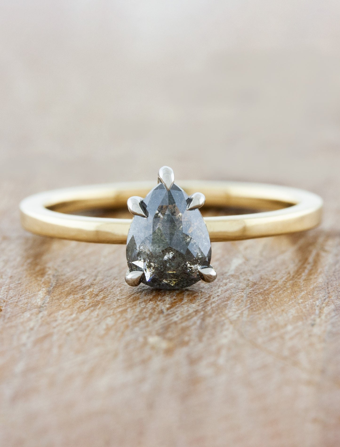 caption:Customized with 0.96ct salt & pepper pear diamond