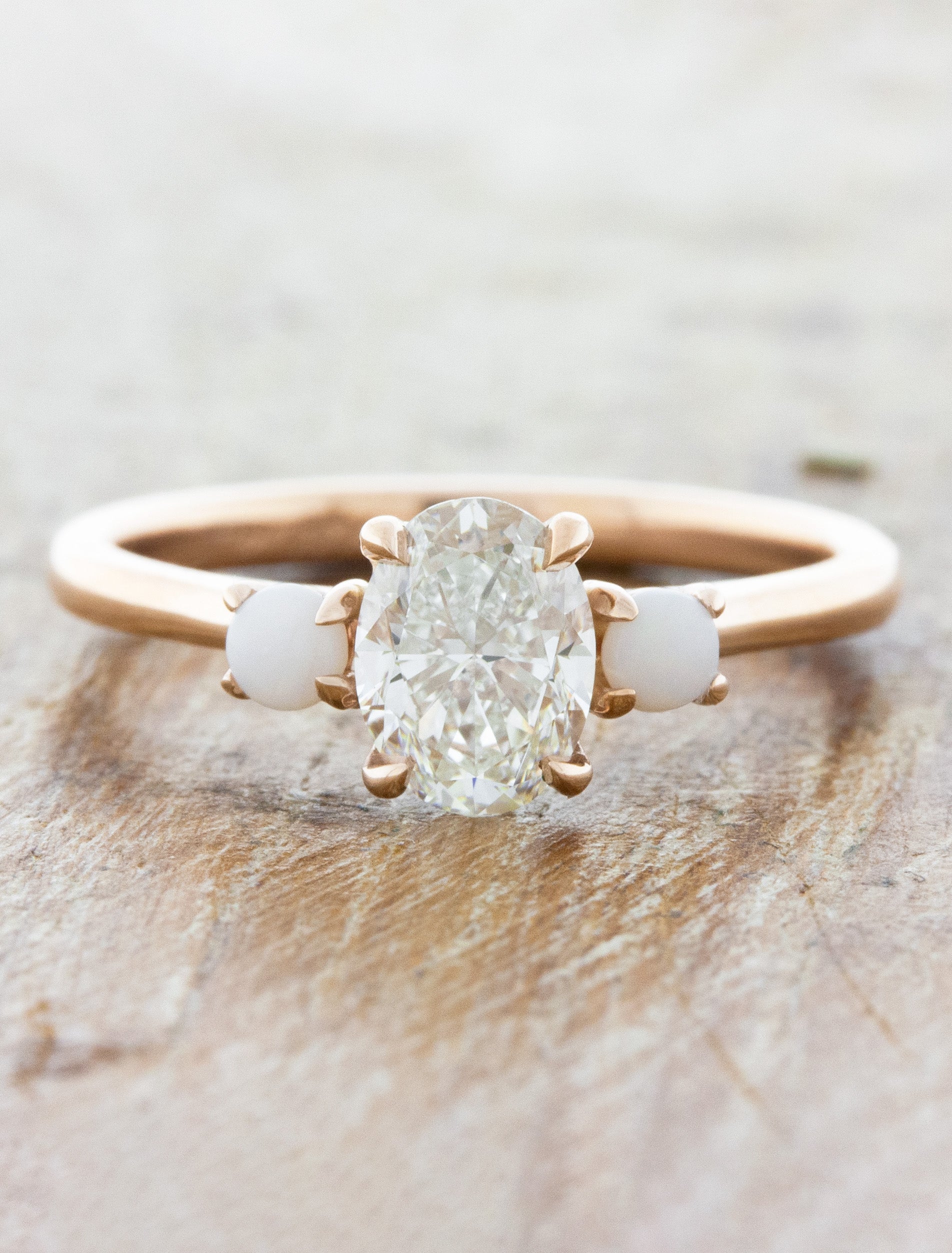 Percy: Three Stone Oval Diamond Ring with Side Opals Ken Dana