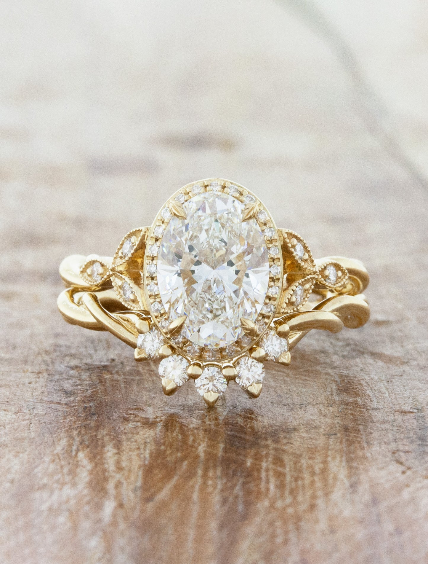 caption:Paired with Milo wedding band in 14k yellow gold