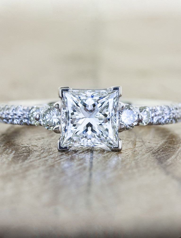caption:Shown with 1ct princess cut diamond in platinum
