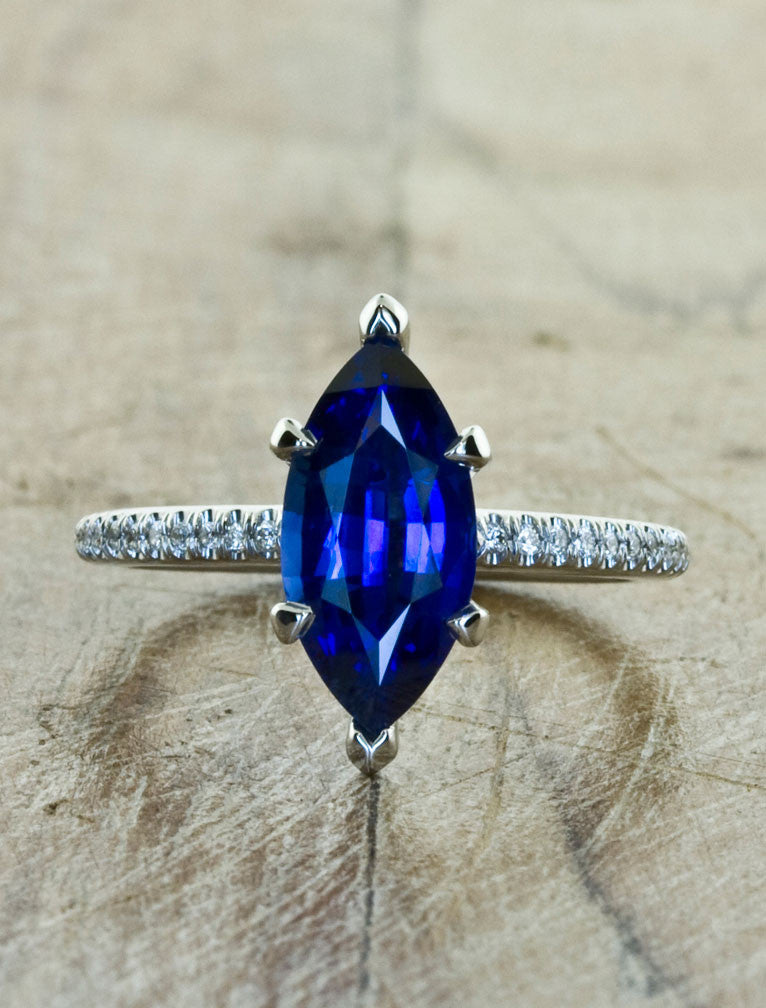 caption:Customized with marquise blue sapphire in platinum