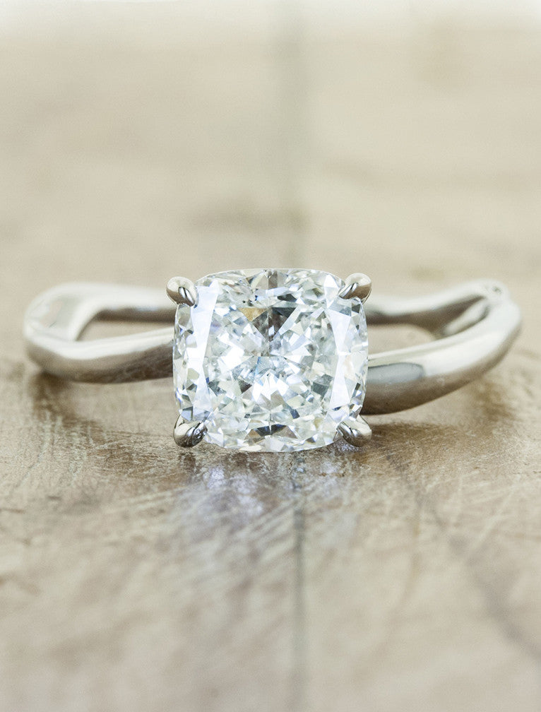 caption:Shown with 1.25ct cushion cut diamond in 14k white gold