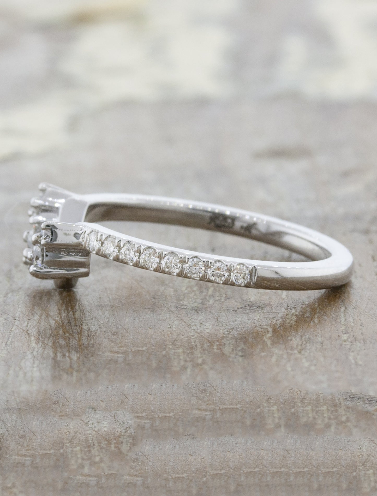 Intricate Wedding Ring with Round Diamond Clusters