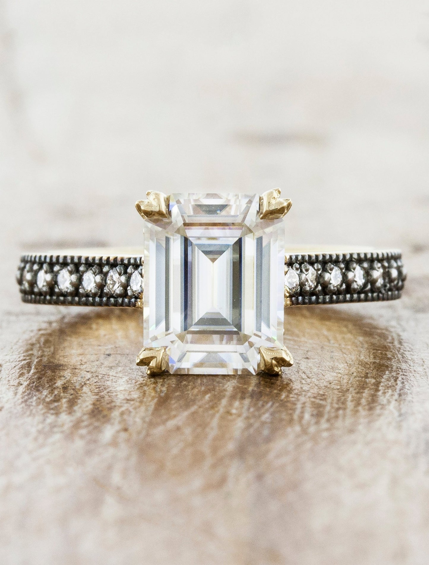 caption:Customized with emerald cut diamond in 14k yellow gold