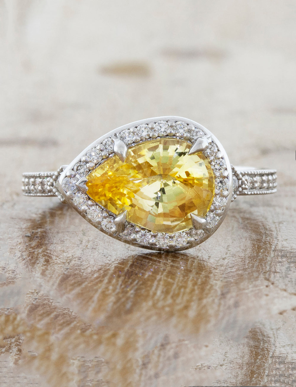 caption:Customized with pear yellow sapphire in platinum