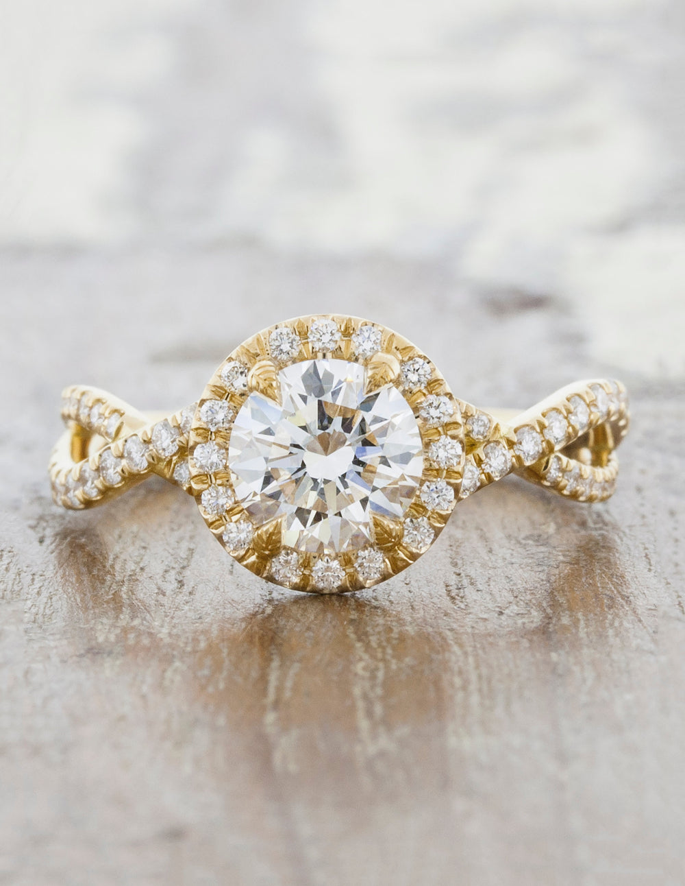 caption:Shown with 1.00ct round diamond in 14k yellow gold