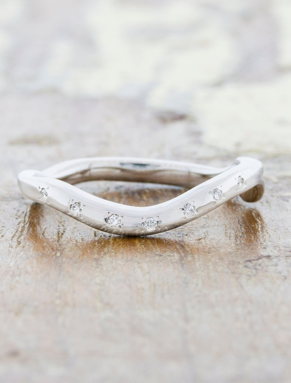 caption:Customized with scattered diamonds in 14k white gold