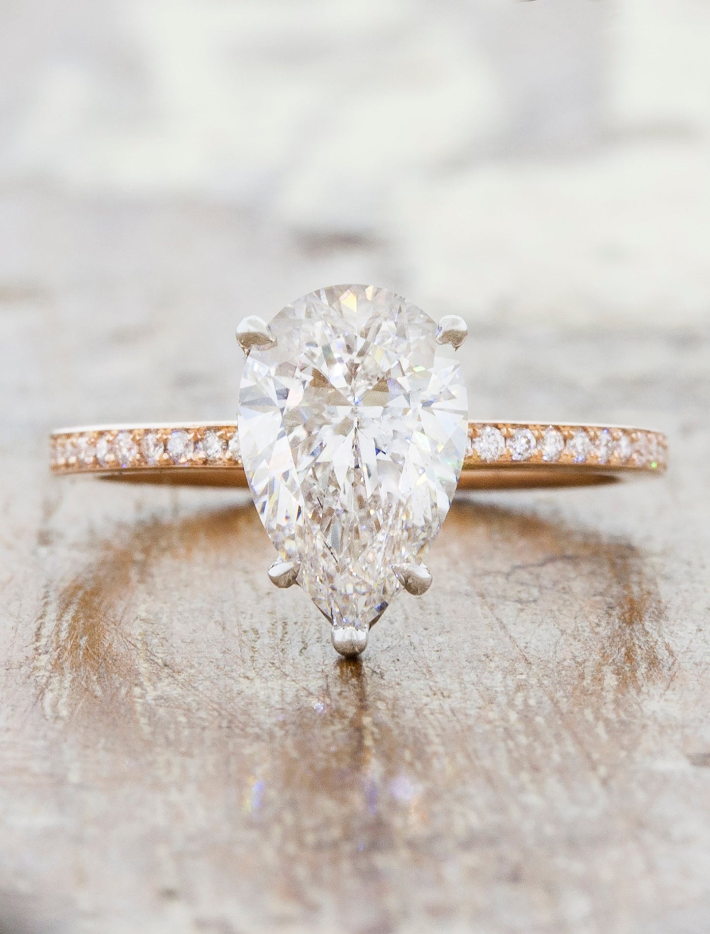 caption:Shown with 1.50ct pear diamond in mixed 14k rose gold & platinum setting