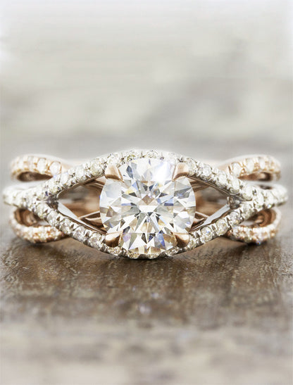 caption:Shown in 14k rose gold and platinum with a 1ct center stone