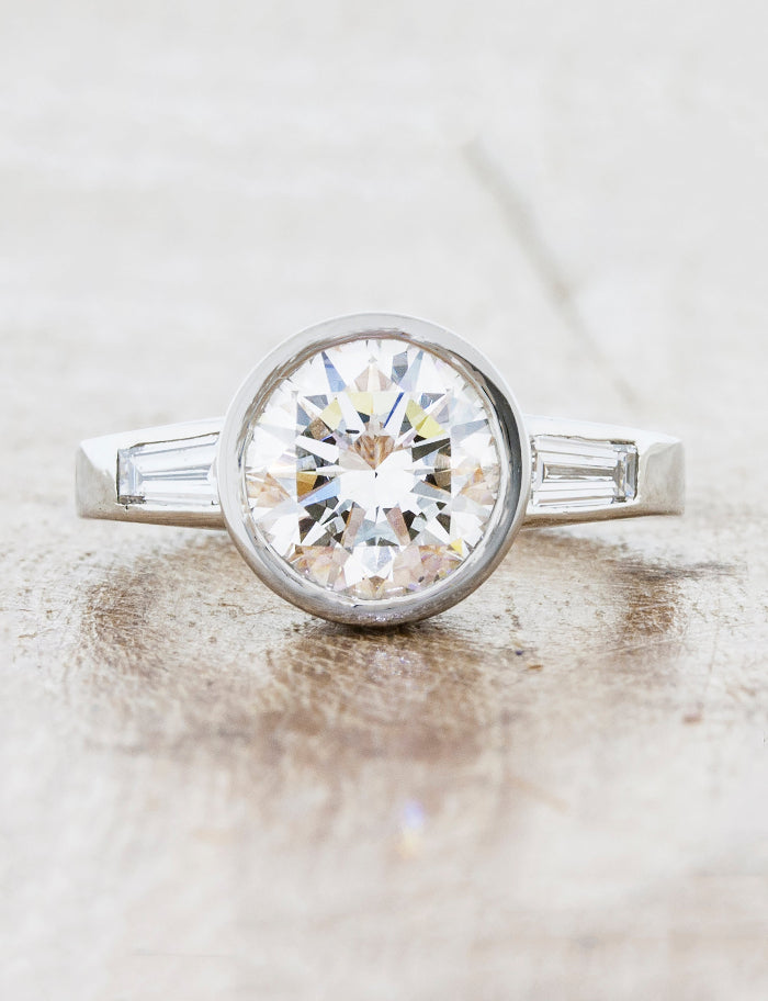 caption:Shown with 2.00ct round diamond in platinum