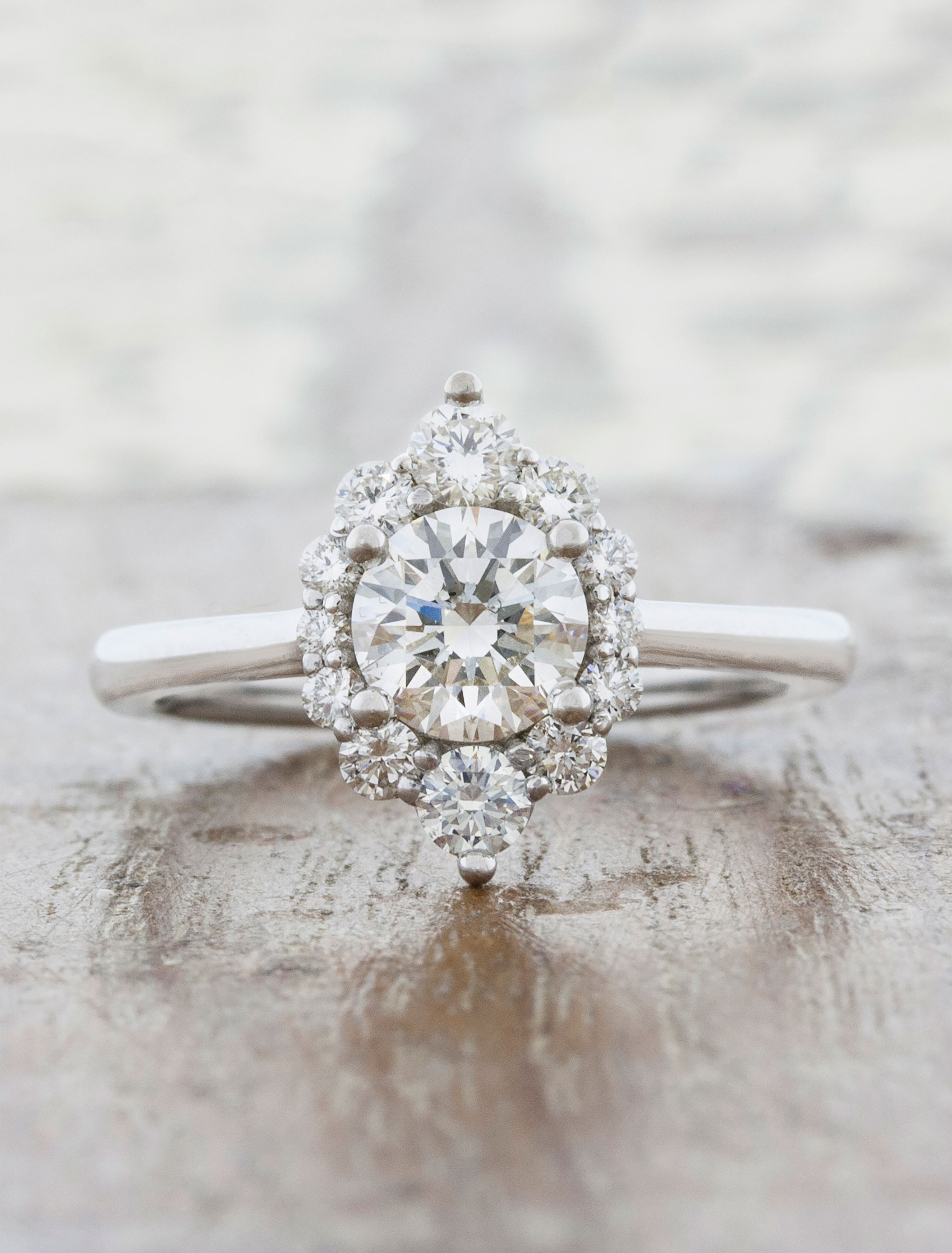Talin: Intricate Star-Shaped Halo Oval Diamond Engagement Ring Ken Dana
