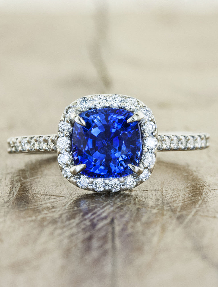 caption:Customized with cushion cut blue sapphire in platinum