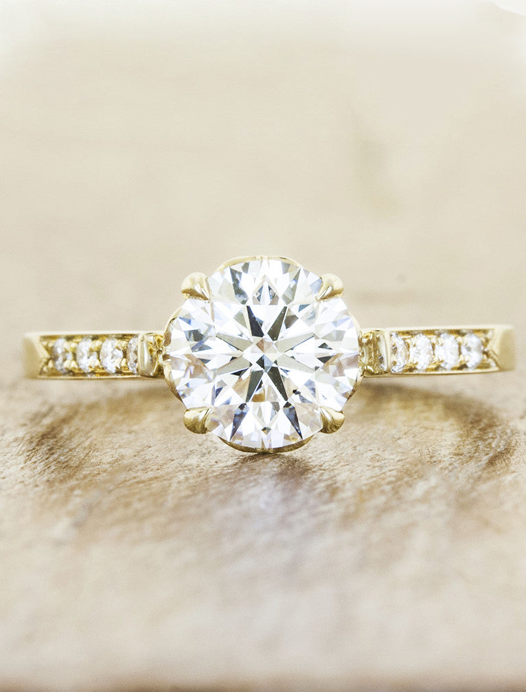 caption:Shown with 1.20ct round diamond in 14k yellow gold with custom prong orientation