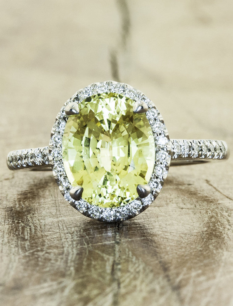 caption:Customized with oval yellow sapphire in platinum