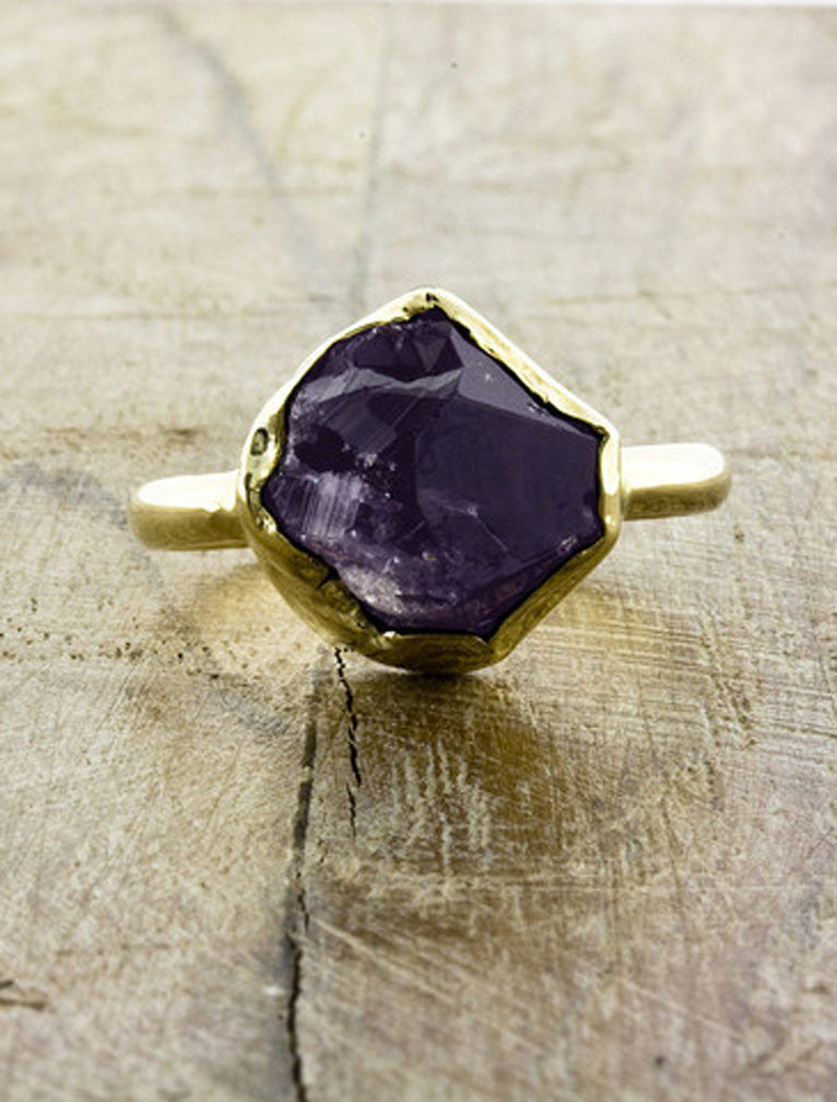 caption:Shown with rough cut amethyst in yellow gold