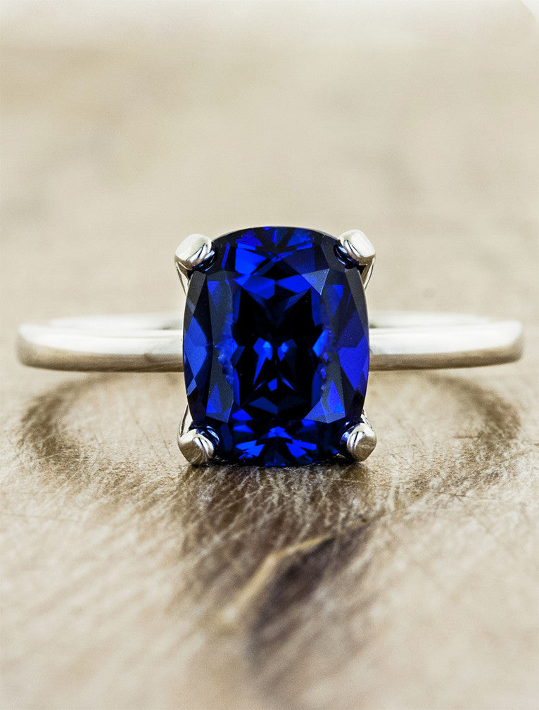 caption:Customized with elongated cushion cut blue sapphire in white gold