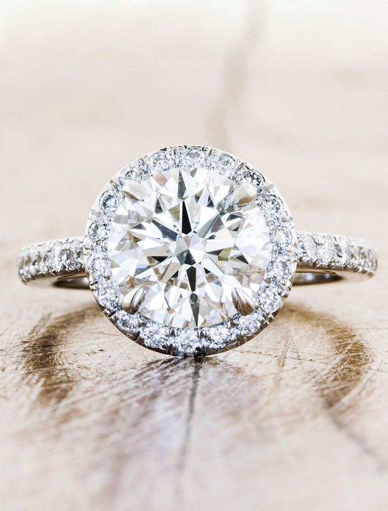 A Classic Halo Pave Engagement Ring. caption:Shown with a 2.15ct center diamond