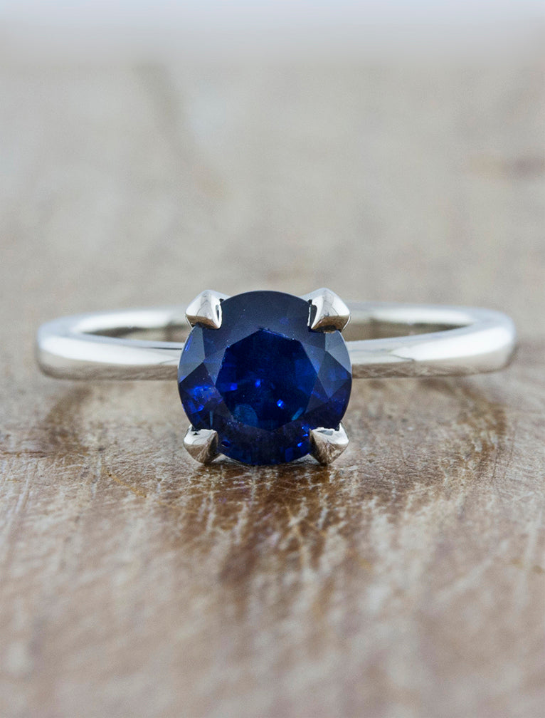caption:Customized with a 1.50ct round sapphire in platinum