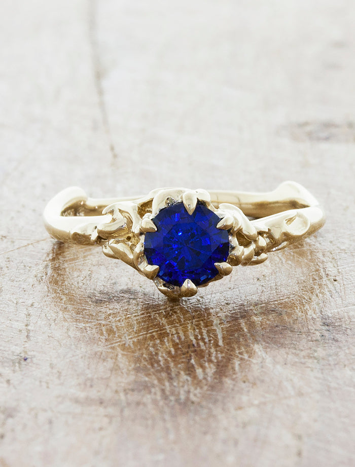 caption:Customized with blue sapphire in 14k yellow gold