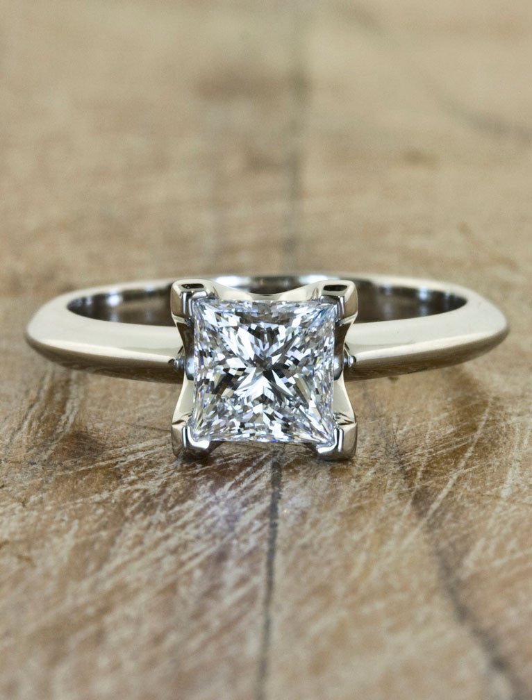 caption:Shown with princess cut diamond in platinum