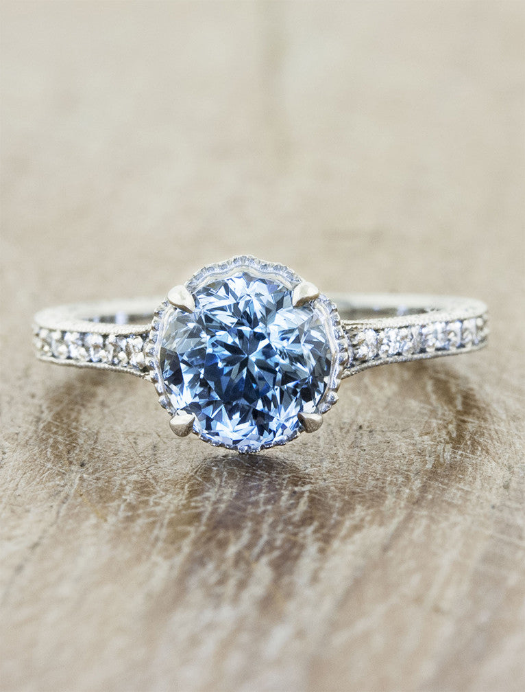 caption:Customized with 1.75ct round sapphire in 14k white gold