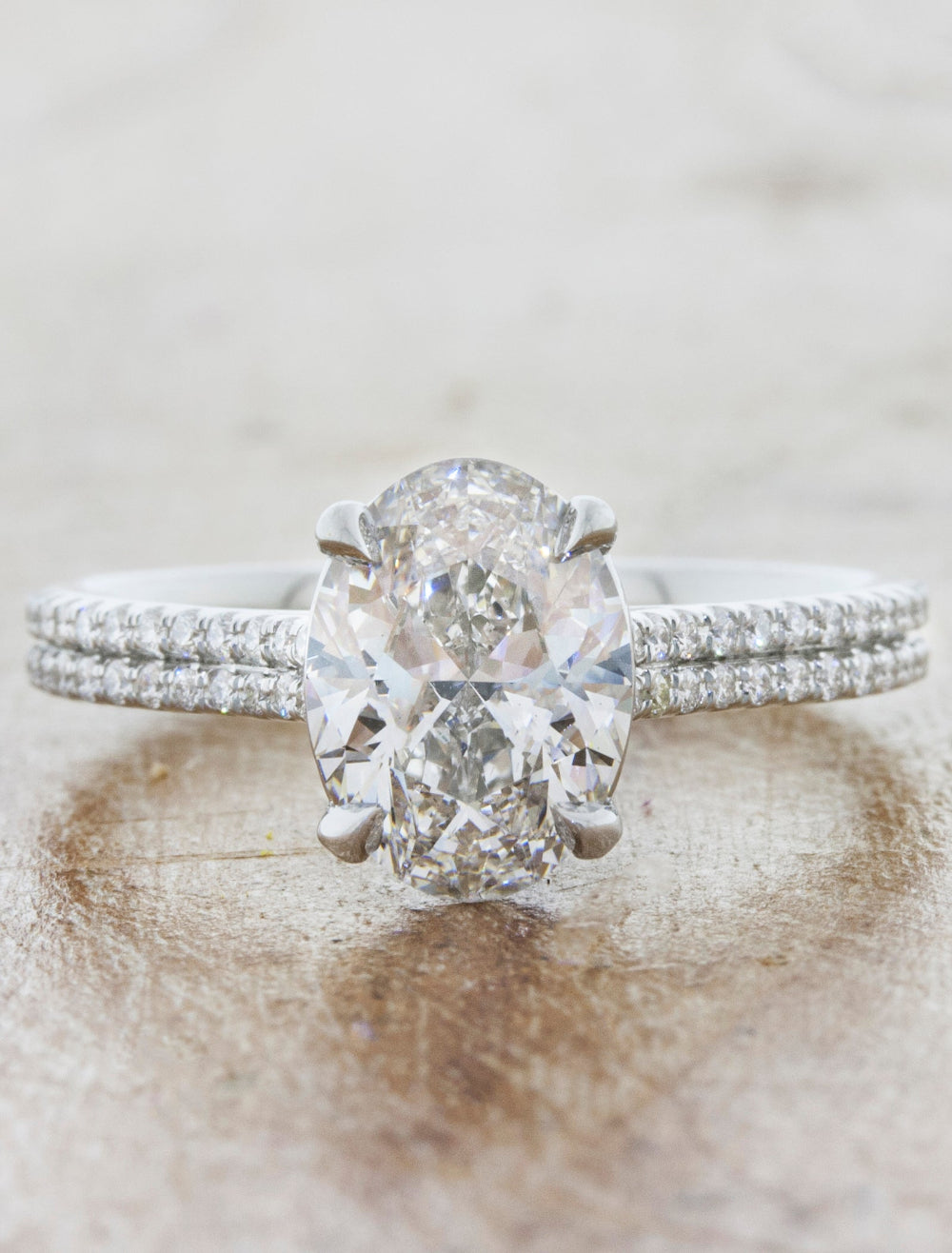 caption:Customized with 2.08ct oval diamond in platinum