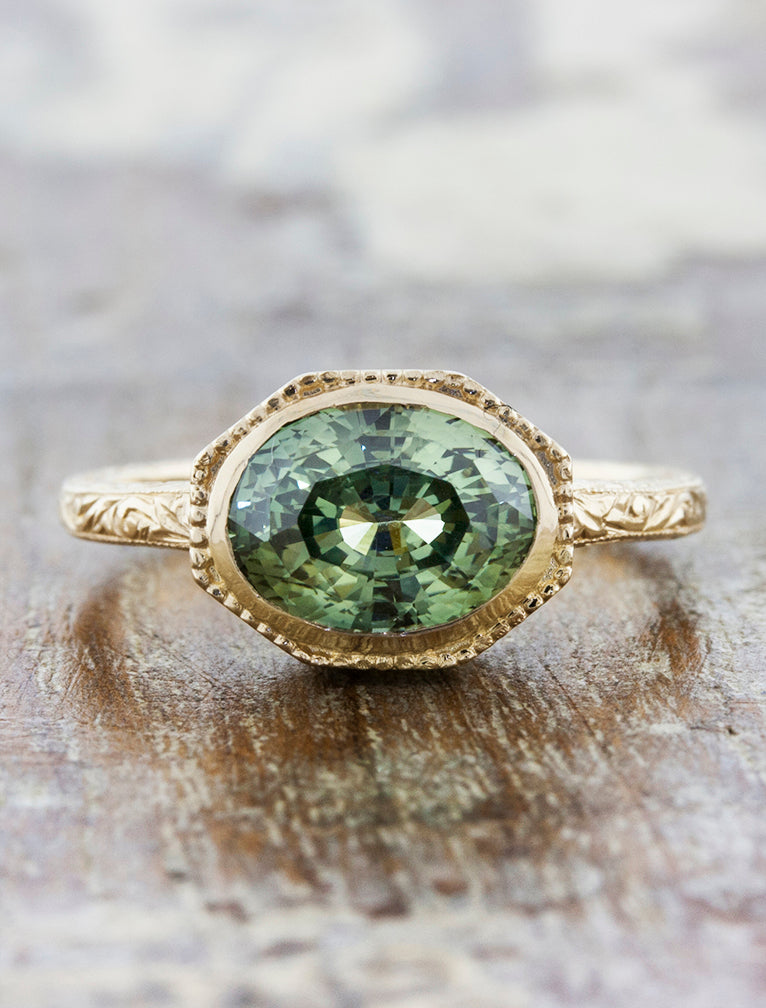 Reveniss: Intricate Oval Blue-Green Sapphire Ring Ken Dana Design