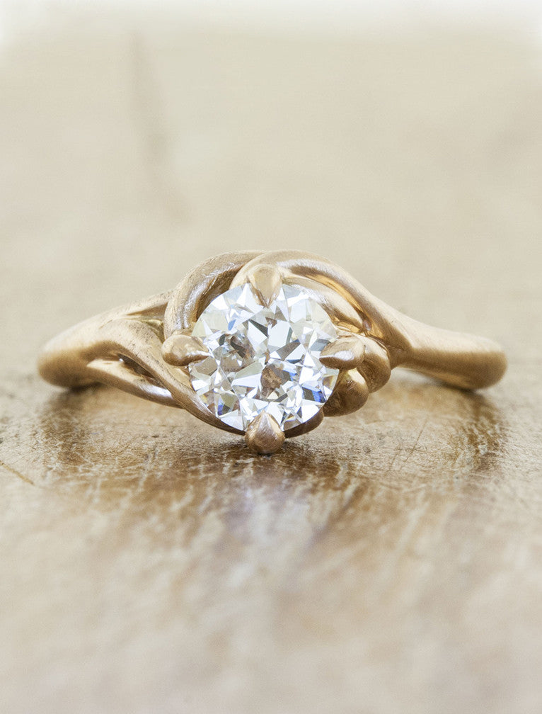 caption:Shown with 0.60ct round diamond in 14k rose gold