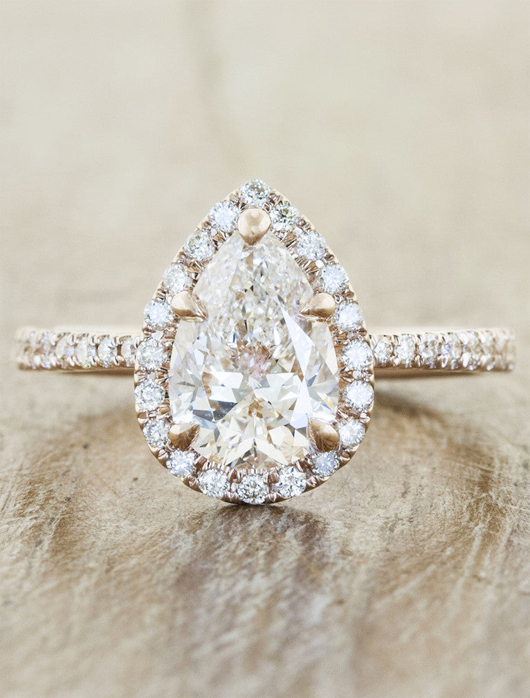 caption:Shown with 1.25ct pear diamond in 14k rose gold