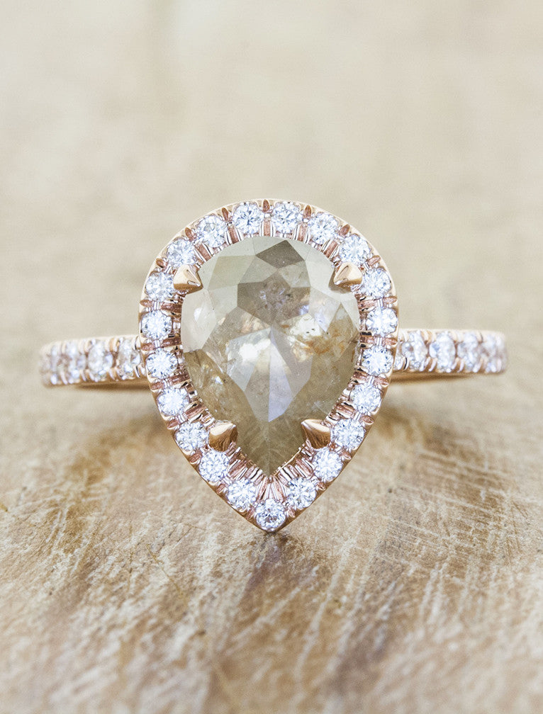 caption:Customized with vertically set rustic pear diamond in 14k rose gold