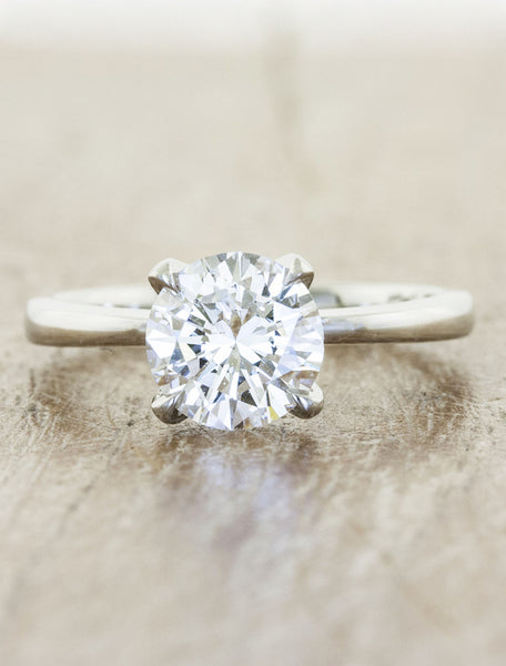 Engagement ring tapered band;caption:1.25ct. Round Diamond 18k White Gold