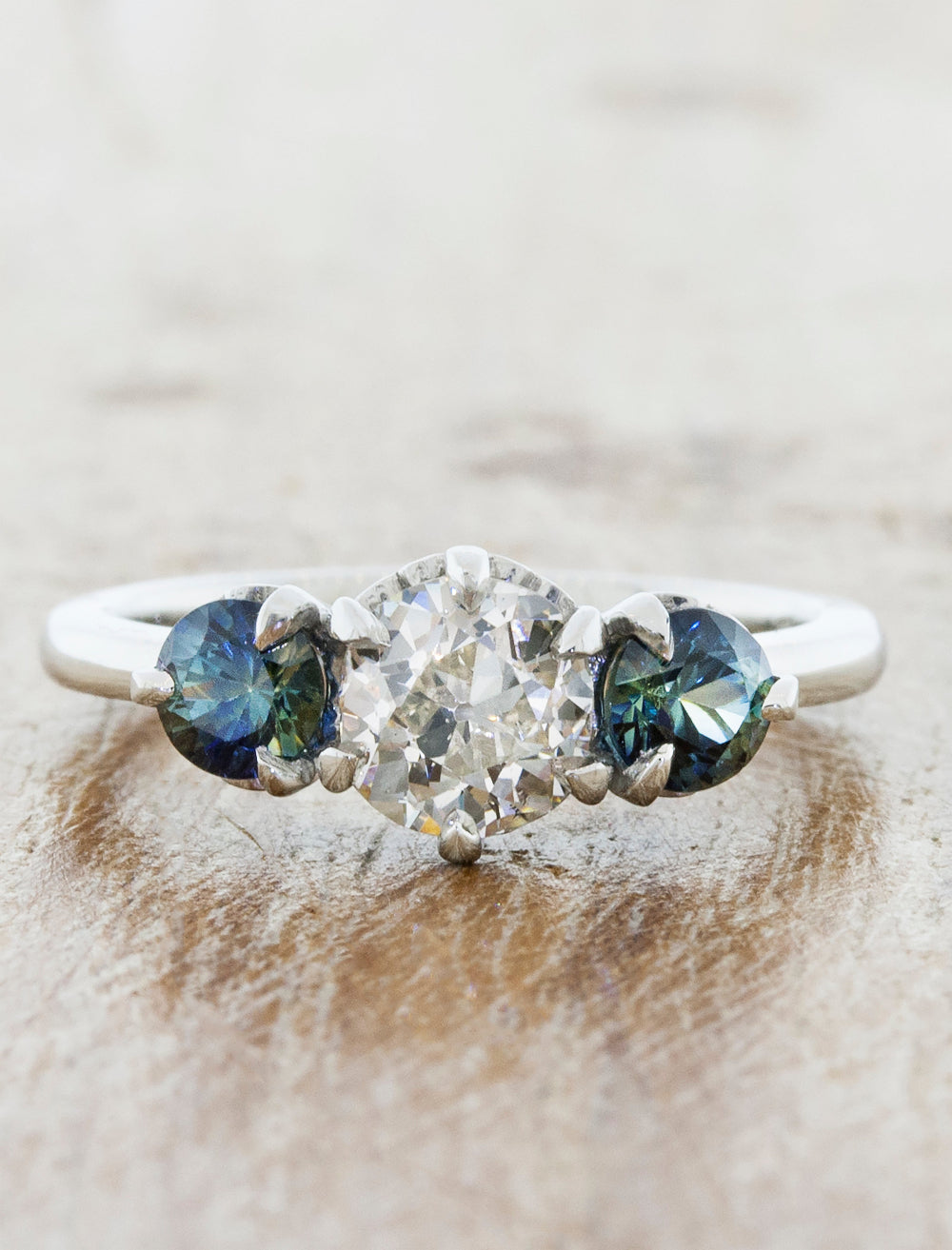 caption:Customized with 0.74ct Old European cut diamond & sapphires side stones in platinum