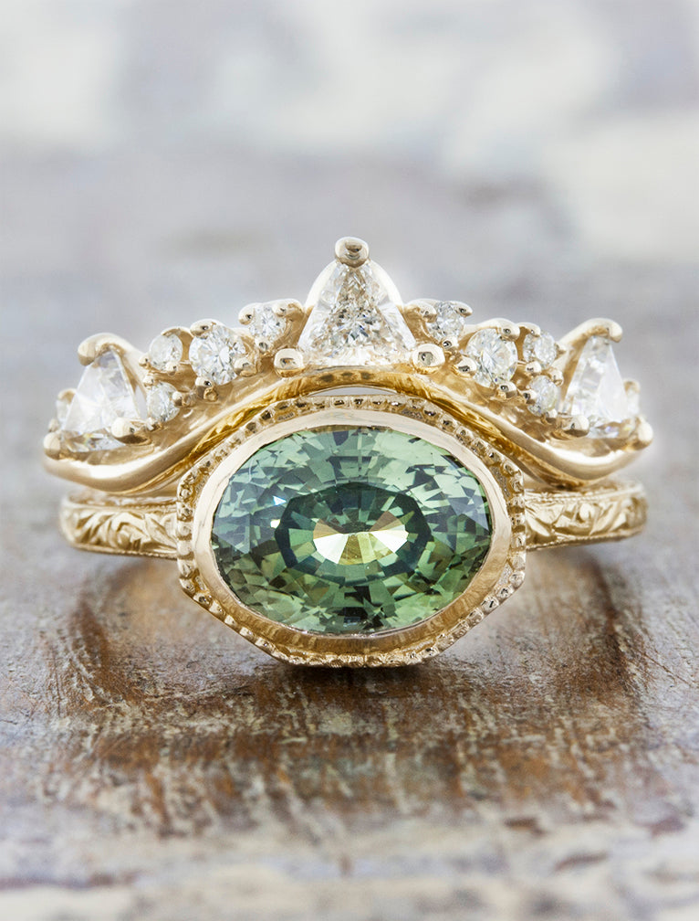 caption:Paired with Reveniss engagement ring in 14k yellow gold