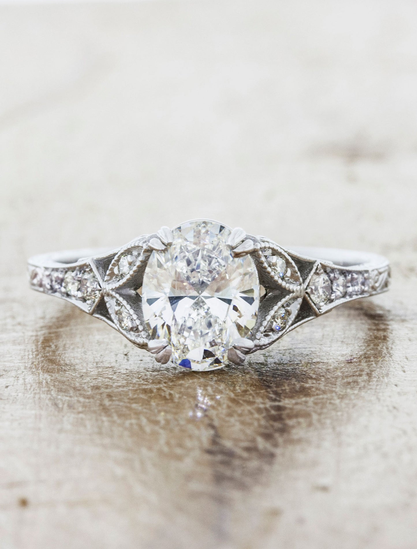 caption:Shown with 1.2ct oval diamond in platinum