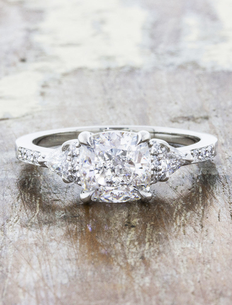 caption:Shown with 1.70ct cushion cut diamond in 18k white gold