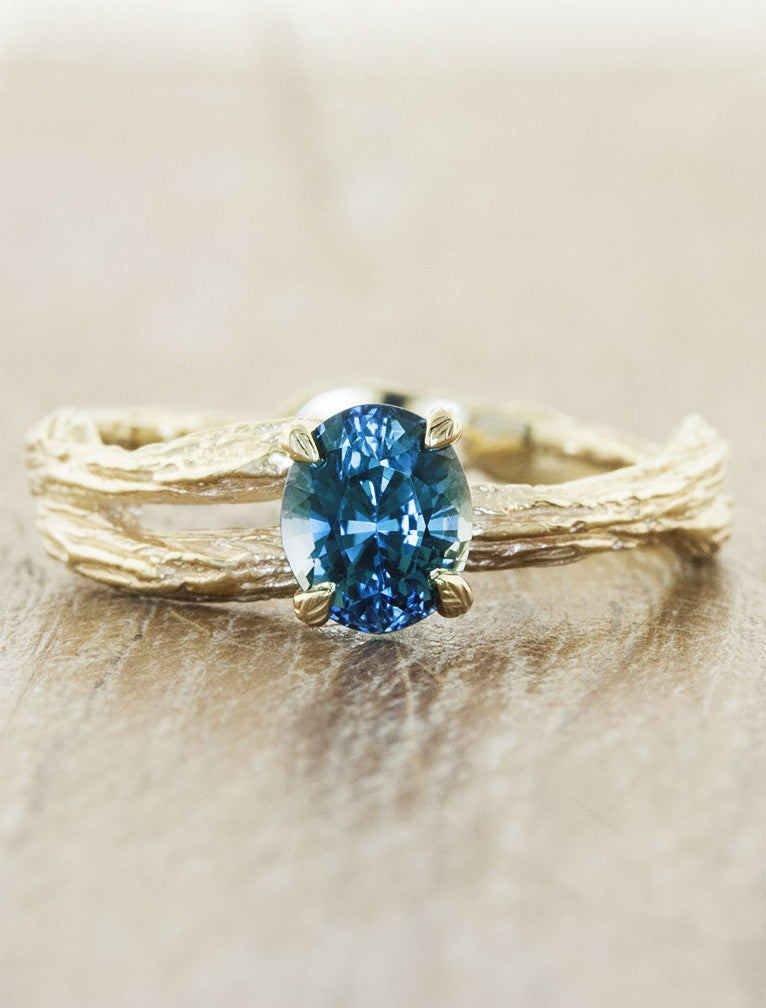 caption:Customized with oval Montana sapphire in 14k yellow gold