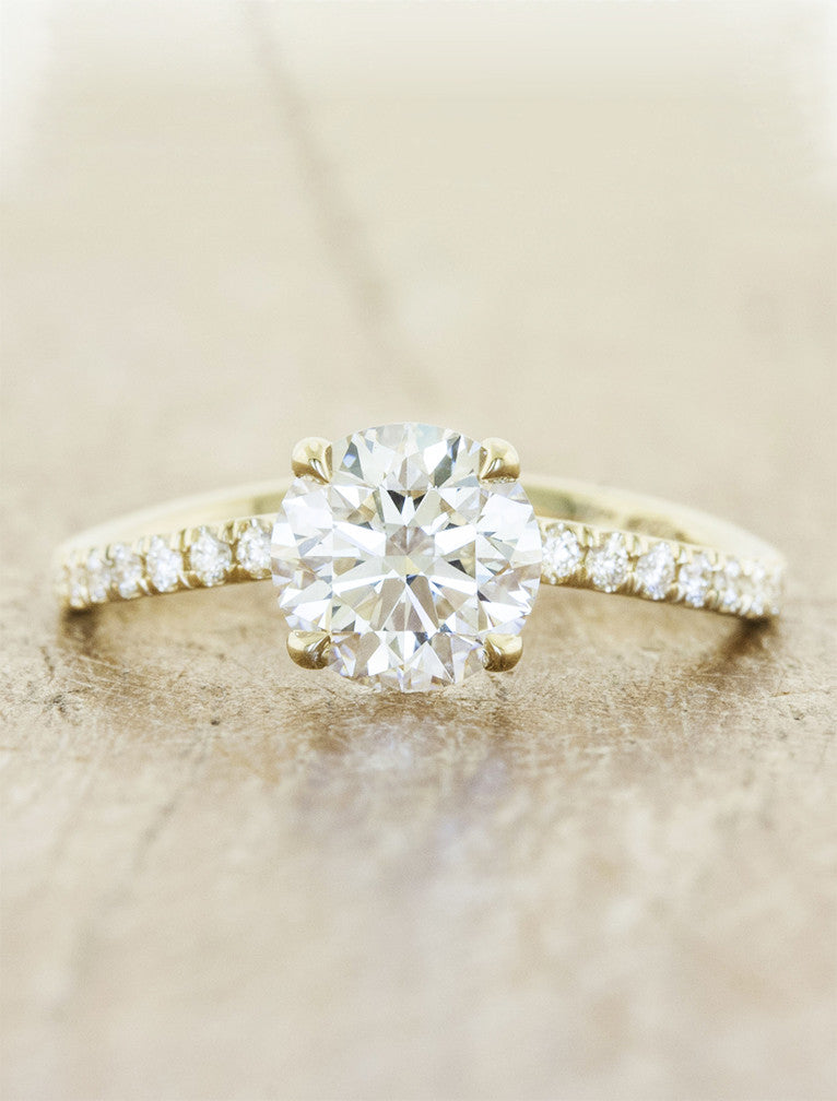 caption:Customized with round diamond in yellow gold